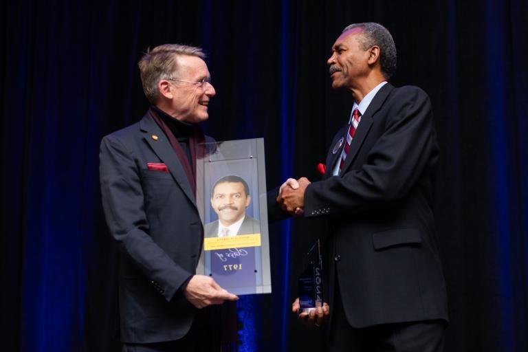 Dr. McMahan congratulates Distinguished Alumnus Award Winner Ron Pirtle '77 